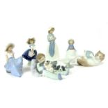 Seven Lladro and Nao figures,