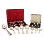 A cased set of twelve silver teaspoons with bright cut decoration,