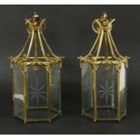 A pair of Regency style brass hexagonal lanterns,