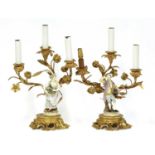 A pair of gilt bronze three-branch candelabra,