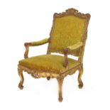 A French giltwood open armchair,