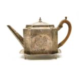 A George III silver teapot and stand,