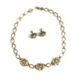 A Symmetalic sterling silver and 14 carat gold enamelled flowerhead necklace