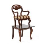 A Victorian mahogany adjustable child’s chair,