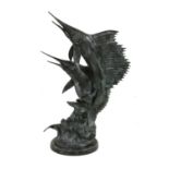 A cast bronze sail fish sculpture,