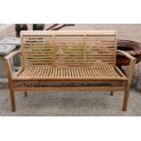 A modern wooden garden bench,