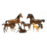 A collection of fourteen Beswick horses,