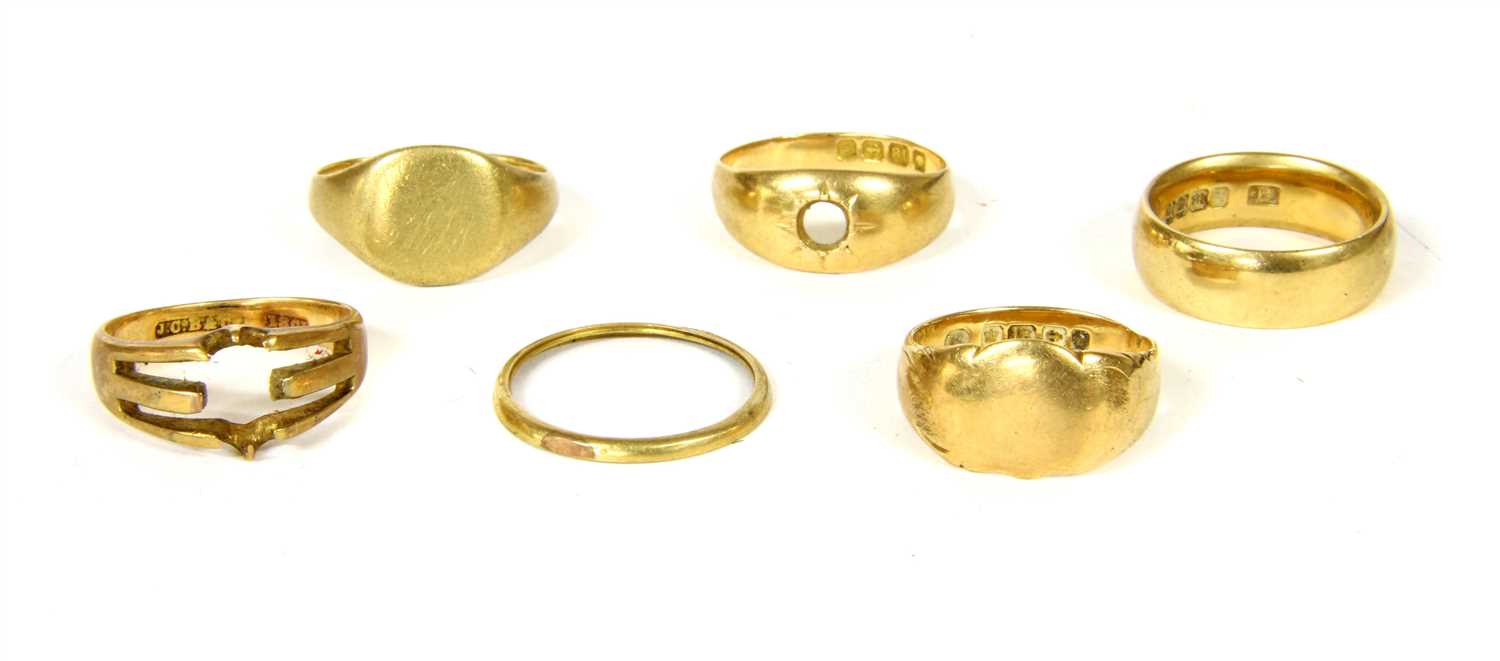 An 18ct gold shield shaped signet ring,