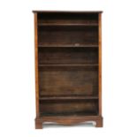A walnut open bookcase