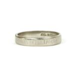 An 18ct white gold flat profile wedding ring,