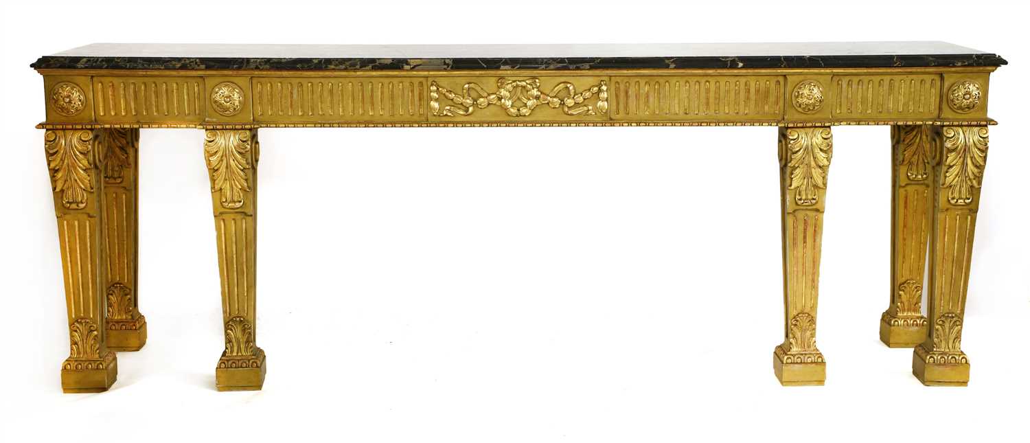 A George III carved and giltwood hall table,