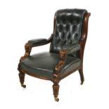 A William IV mahogany and green buttoned leather library chair,