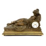 A large Louis XVI-style terracotta mantel clock,