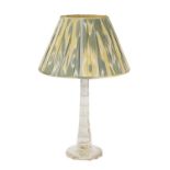 A large faceted glass table lamp,