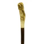 A Japanese antler/bone and partridgewood walking stick,