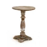 A limed lamp table,