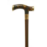 A tortoiseshell and snakewood walking stick,