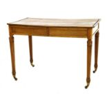 A walnut writing table,