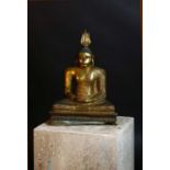 A gilt bronze figure of Buddha,