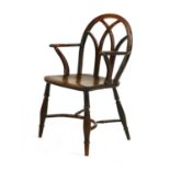 A yew and elm Gothic-type Windsor chair,
