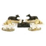Three pairs of greyhounds on marble or alabaster bases,