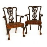 A pair of Chippendale-style mahogany open armchairs,