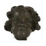 A cast spelter and bronzed head of a Florentine-style boy,