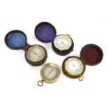 Four pocket barometer/altimeters,