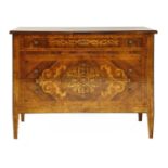 An Italian walnut and inlaid commode chest