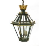 A toleware and glazed hanging lantern,