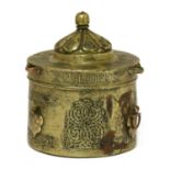 A Persian silver and copper inlaid bronze inkwell,