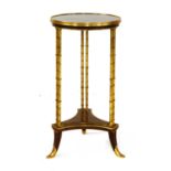 A Regency-style circular occasional table,