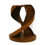 A beech architectural model of a double spiral staircase,