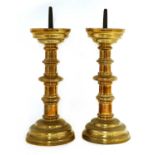 A pair of Flemish brass pricket candlesticks,