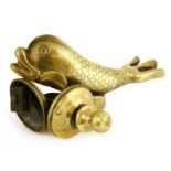 A gilt bronze dolphin door knocker,