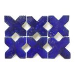 A panel of six pottery cross tiles,