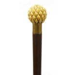 An ivory and snakewood walking stick,