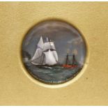 A reverse painted glass roundel depicting the schooner 'Cambria',