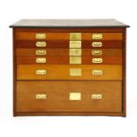 A set of six mahogany drawers,