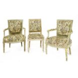 A pair of painted French open armchairs,