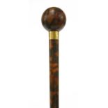 A fine tortoiseshell walking cane by Brigg of London,