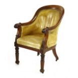A Regency mahogany tub-form library chair,