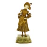 A French gilt bronze and carved ivory figure,
