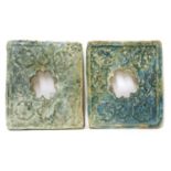 A pair of Kashan turquoise-glazed moulded pottery window tiles,