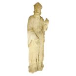 A carved sandstone figure of a saint,