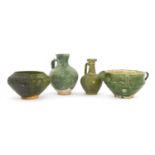 Four Persian green-glazed pottery vessels,