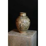 A fragmentary Fatimid lustre pottery jar,