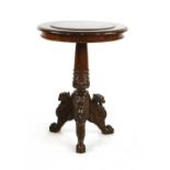 A carved walnut chess table,