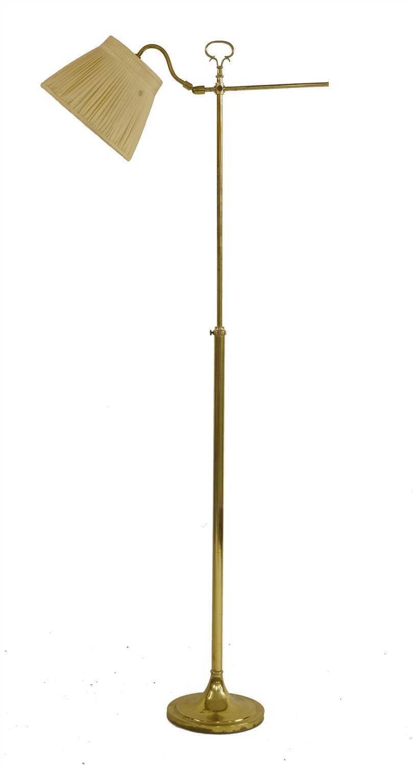An adjustable brass lounge light,