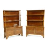A pair of Regency-style bookcases,
